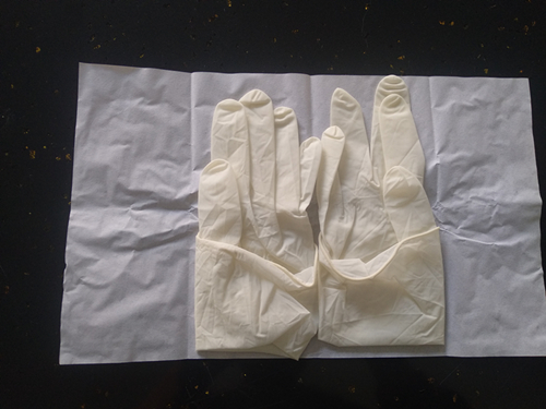 Disposable medical rubber examination gloves