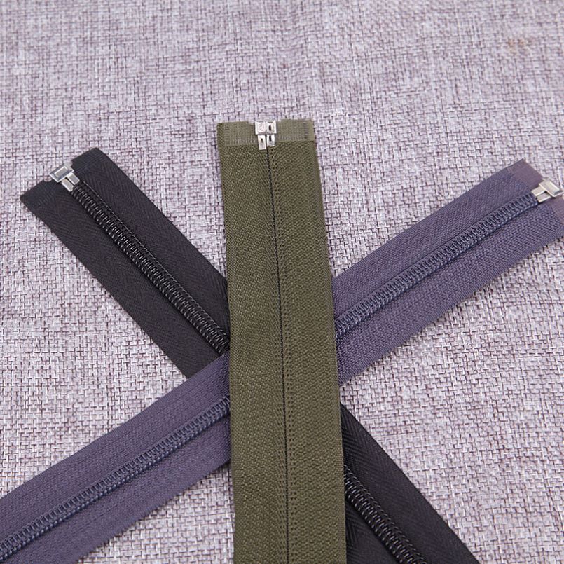 Multicolored garment zippers
