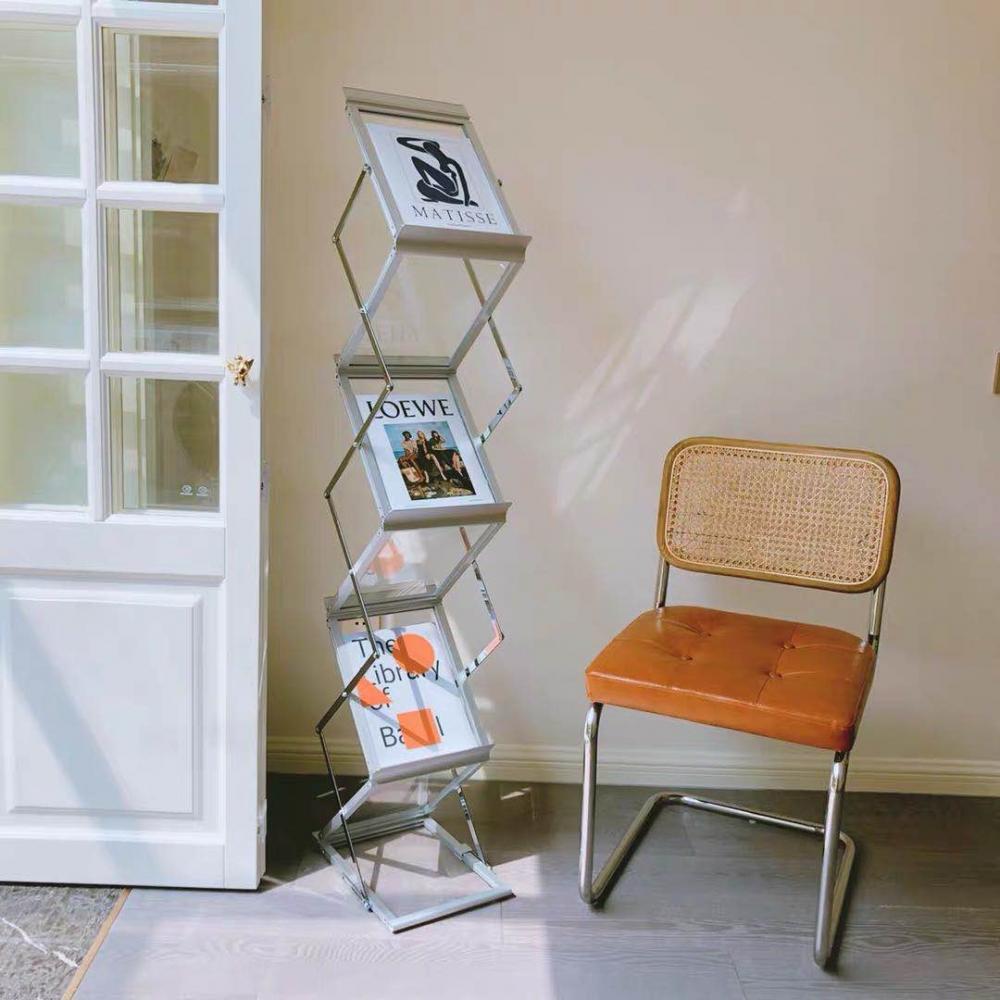 पत्रिका रखने की अलमारी Magazine rack