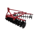 Disc ploughs harrows farmland Tractor