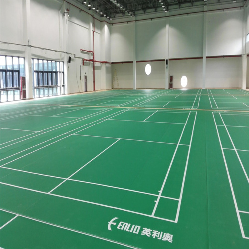 Pavimentazione sportiva da badminton verde con linea di gioco bianca