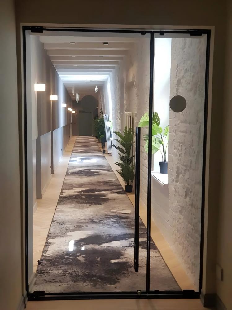 Frameless fire-rated glass