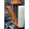 Pallet pre-stretch wrapping machine