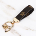 Corde en cuir de porte-clés noire créative pour hommes et femmes PU en cuir porte-clés porte-clés de voiture