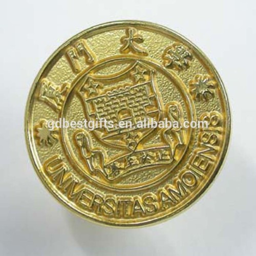 gold round shaped pin