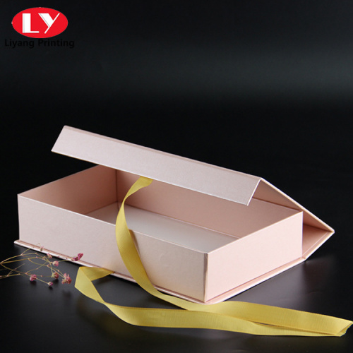 magnetic pink book shaped gift box with ribbon