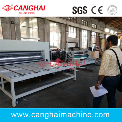 Manual corrugated printing and slotting machine