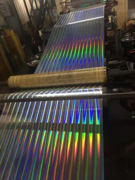 Laminated tinplate with laser effect