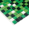 Mixed greens glass tile backsplash installation