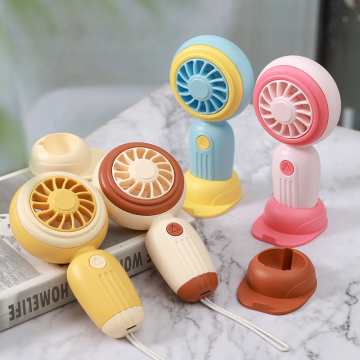 Handheld rechargeable fan with base and hanging cord
