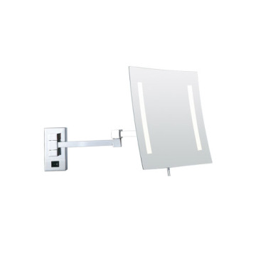 Frameless magnifying lighted wall mirror