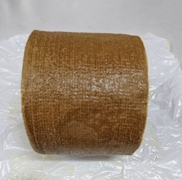 Greasy and brown Petrolatum tape