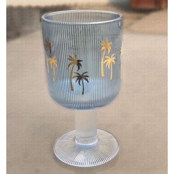 Ribbed wine glass cup with gold bee decal