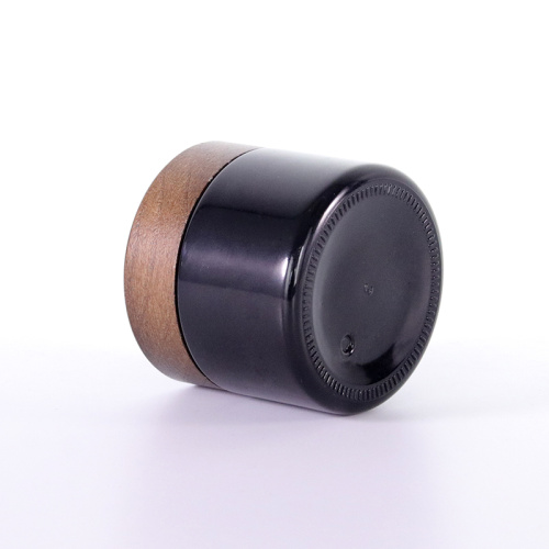 Black Cosmetic Jar for Skincare Eco-friendly Black frosted glass cream jar with wooden cap Factory
