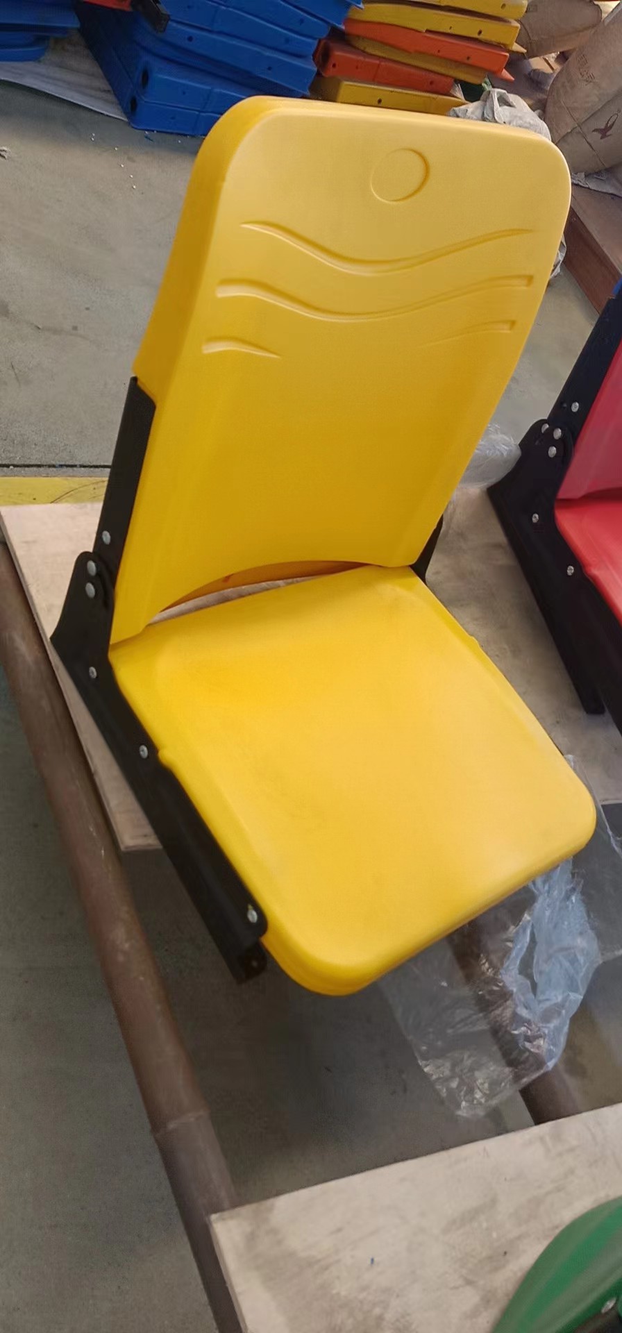 Front mounted folding seat