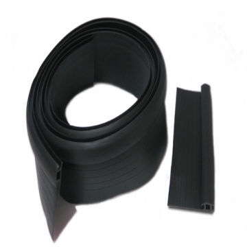 wearable plastic extrusion seal for garage door