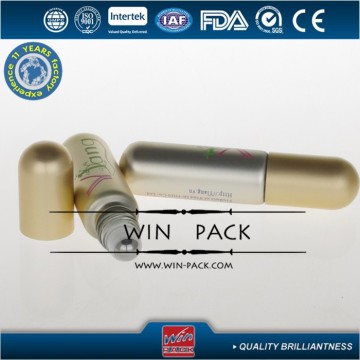 matte golden roll on glass bottle with round bottom for cosmetic oil, roller on glass bottle with metal cap and metal roller