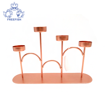Set di portacandele a 4 bracci in metallo oro rosa