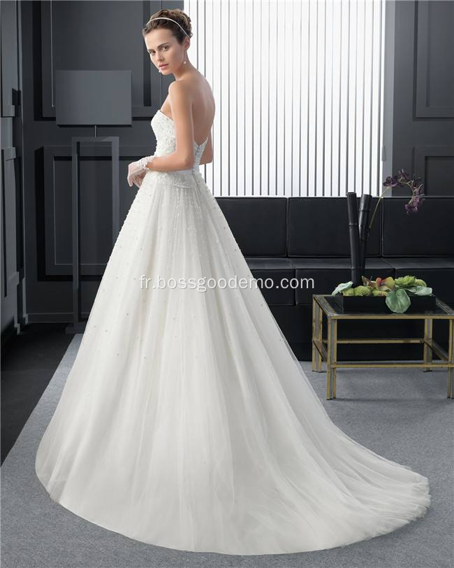 Robe de mariée manches longues à col haut cou