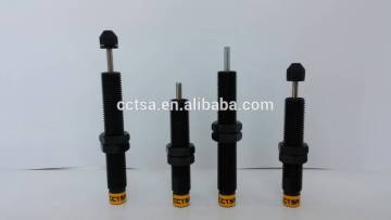 Self-compensating industrial shock absorber for load break switch
