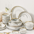 Set di ceramica marmorizzazione dorata