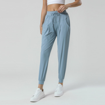 pantalon yoga fanm ak pòch