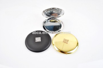 double sided round cosmetic mirror with gold and black