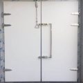 Insulated walk-in cooler doors