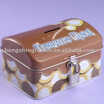 Dome shaped tin saving box with lock, key and coin hole, size 127*92*27 mm