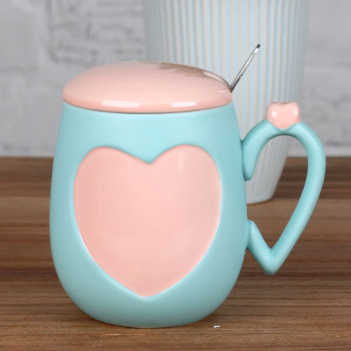 four leaf clover and heart coffee mug