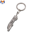 Keychain atá múnlaithe ag carranna cruan saincheaptha