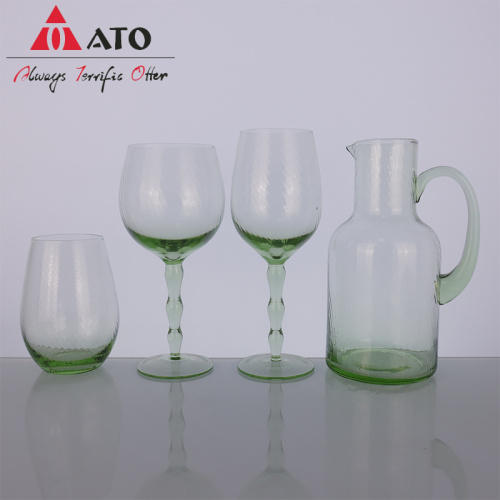 Hand blown dark green colored wine glass set