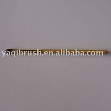 golden yellow cosmetic brush