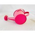 Pink metal kids watering can