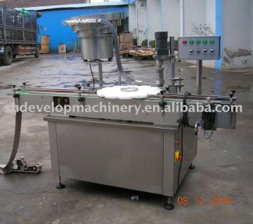 XG-50 Screw or press capping machine