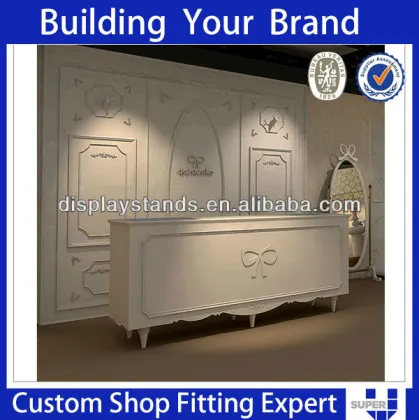 clothing store display design tailor made white modern reception desk