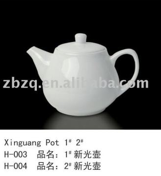 white porcelain dinnerware tea pot