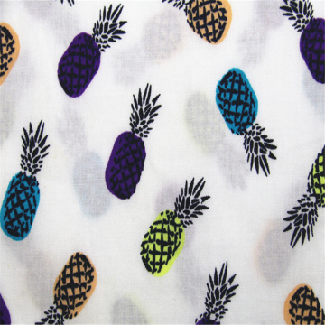 Cotton poplin with pineapple print on white background