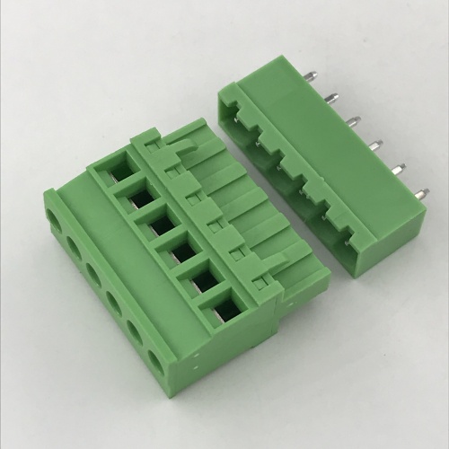 Vertical pin connector beside sealed terminal block