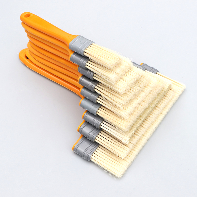 peinture de brosse à poignée en plastique de couleur jaune