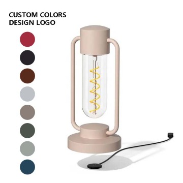 Wholesale Rechargeable Modern Decorative Bedside Hotel Gold Battery Table Lamp" could be shortened to:

"Modern Rechargeable Gold Battery Table Lamp for Hotel Bedroom" 

However, if we need to stick closely to your instruction of deriving it directly from