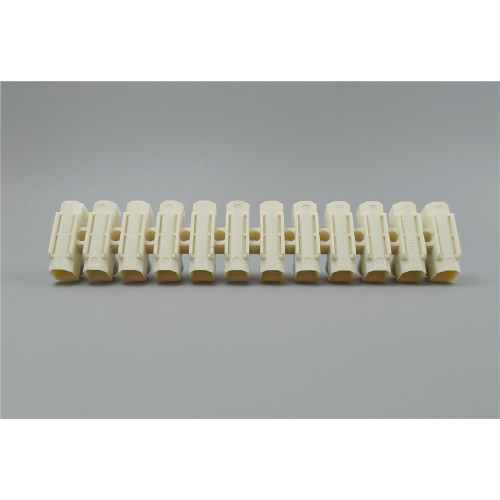 Raised base terminal strips made of polyamide