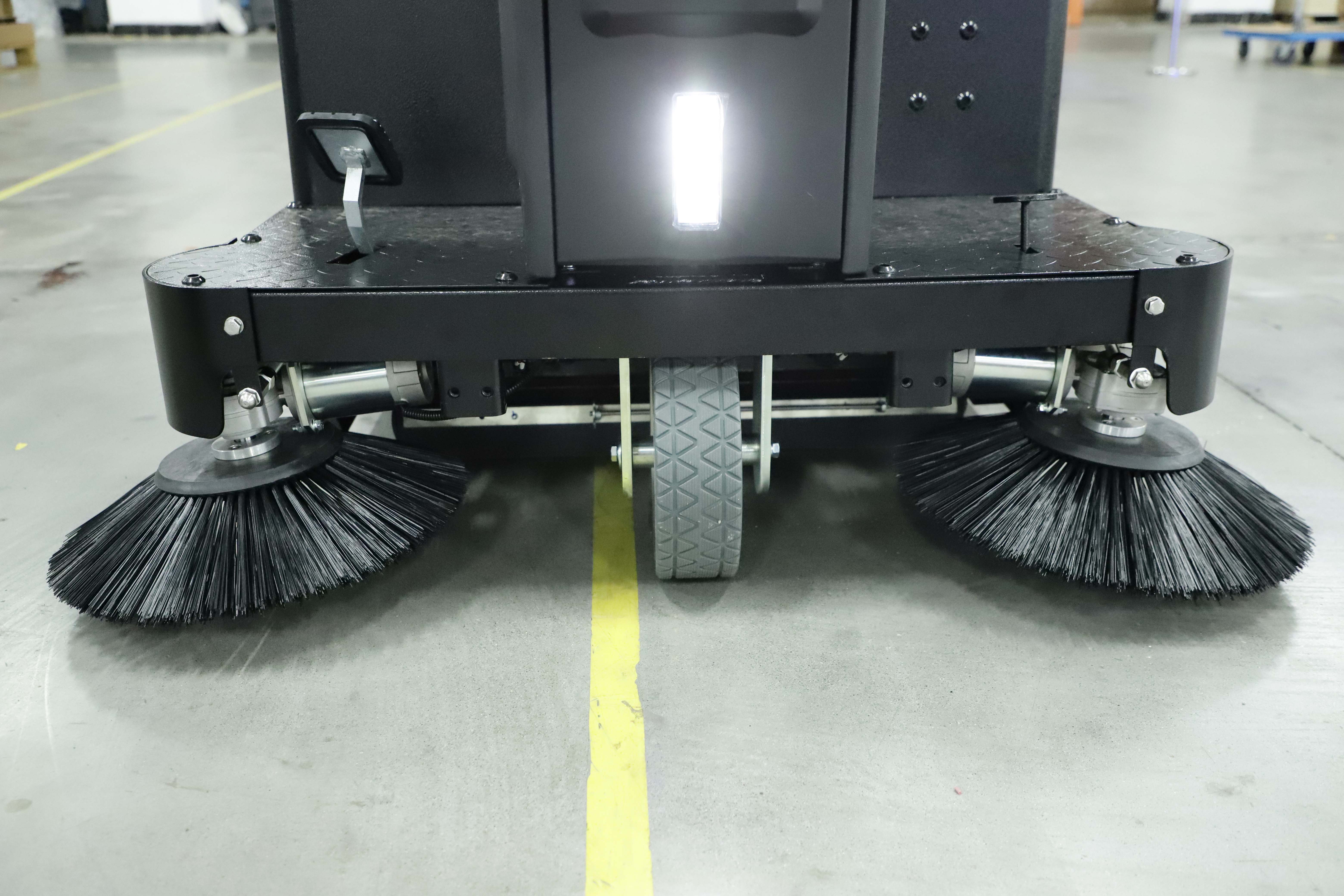 Ride-on floor sweeper