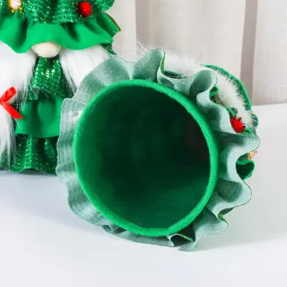 Christmas Skirt Tree: Unique Decorations Featuring a Green Tree, Faceless Old Man, Stars, and a Doll