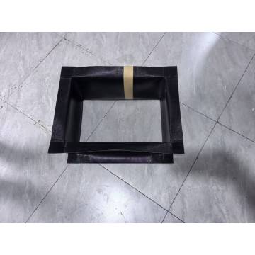 Тканевый компенсатор из ПТФЭ для химических перерабатывающих предприятий, работающих с агрессивными средами.