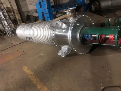 Rotary scraper film evaporator