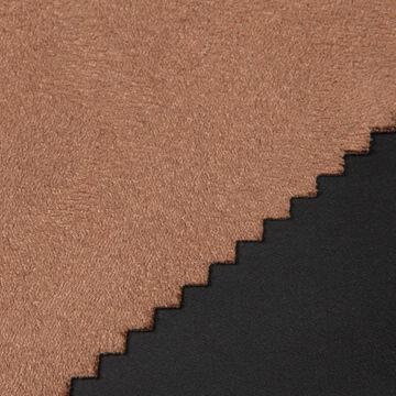 Suede fabric with petroleum-based dry cleaning agent