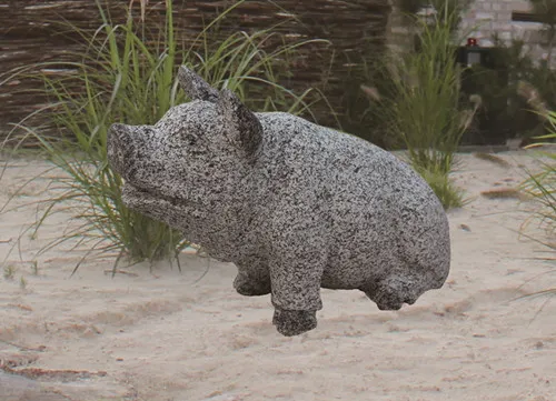 Garden pig stone statue