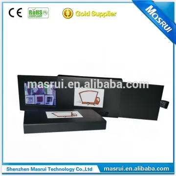 Stretched open 2.4 inch mini videopak LCD video business card
