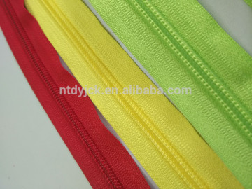 Plastic nylon zipper with head to head slider china supplier